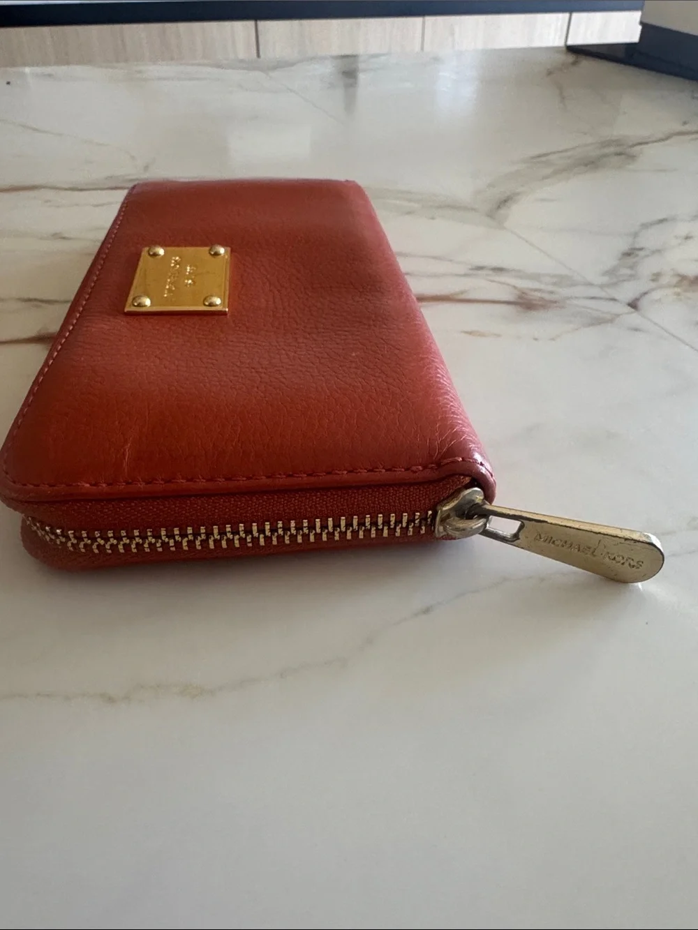 Michael Kors Brick Red Leather Zip-Around Wallet with Gold Plaque